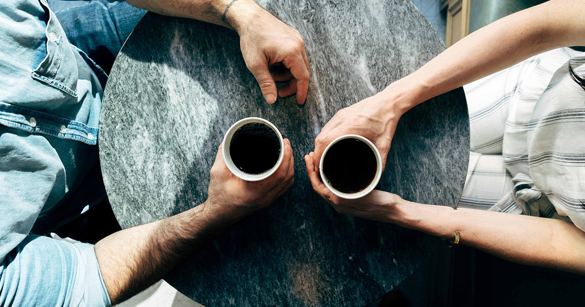 two people connecting over coffee